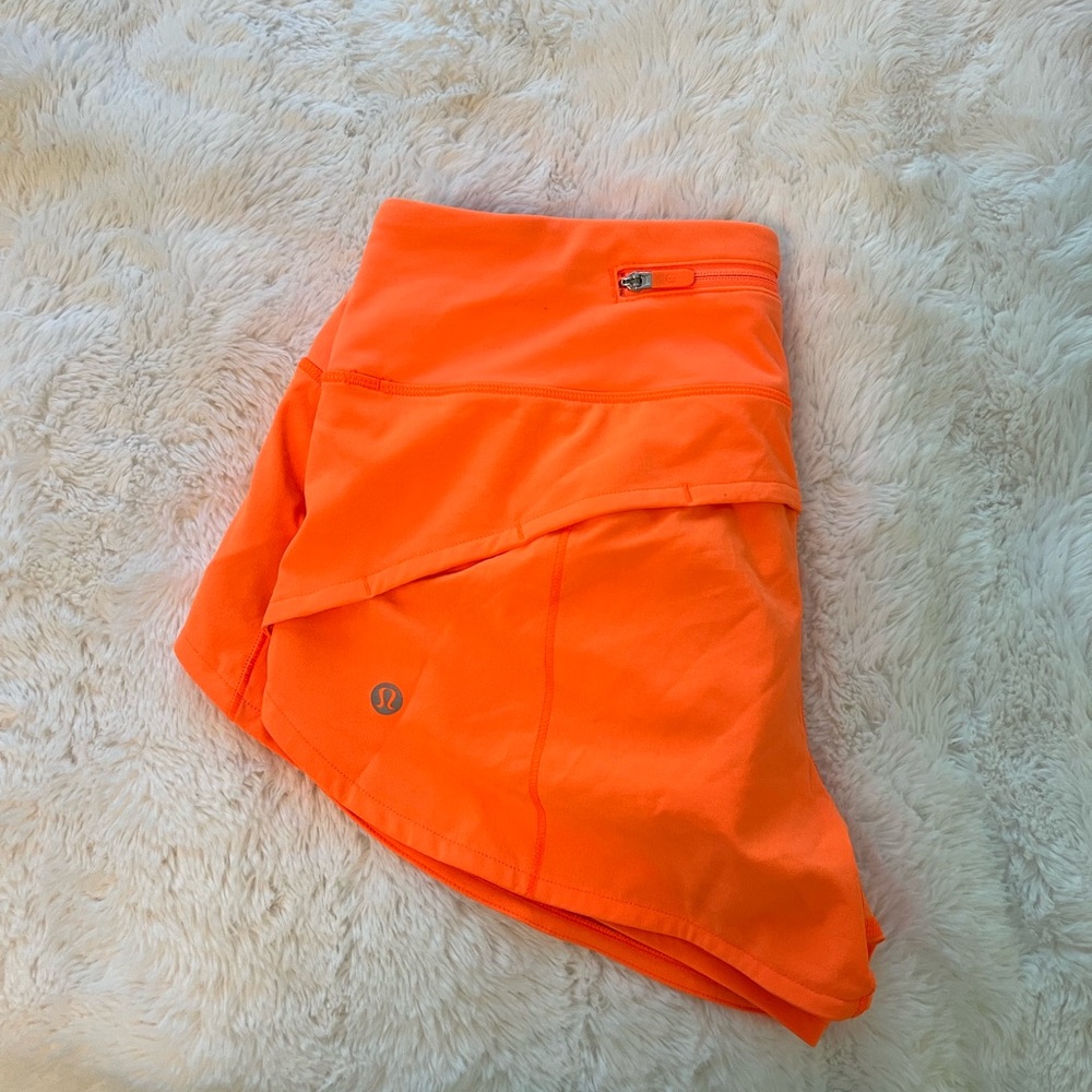 Neon orange lululemon speed up shorts size 4, 2.5in